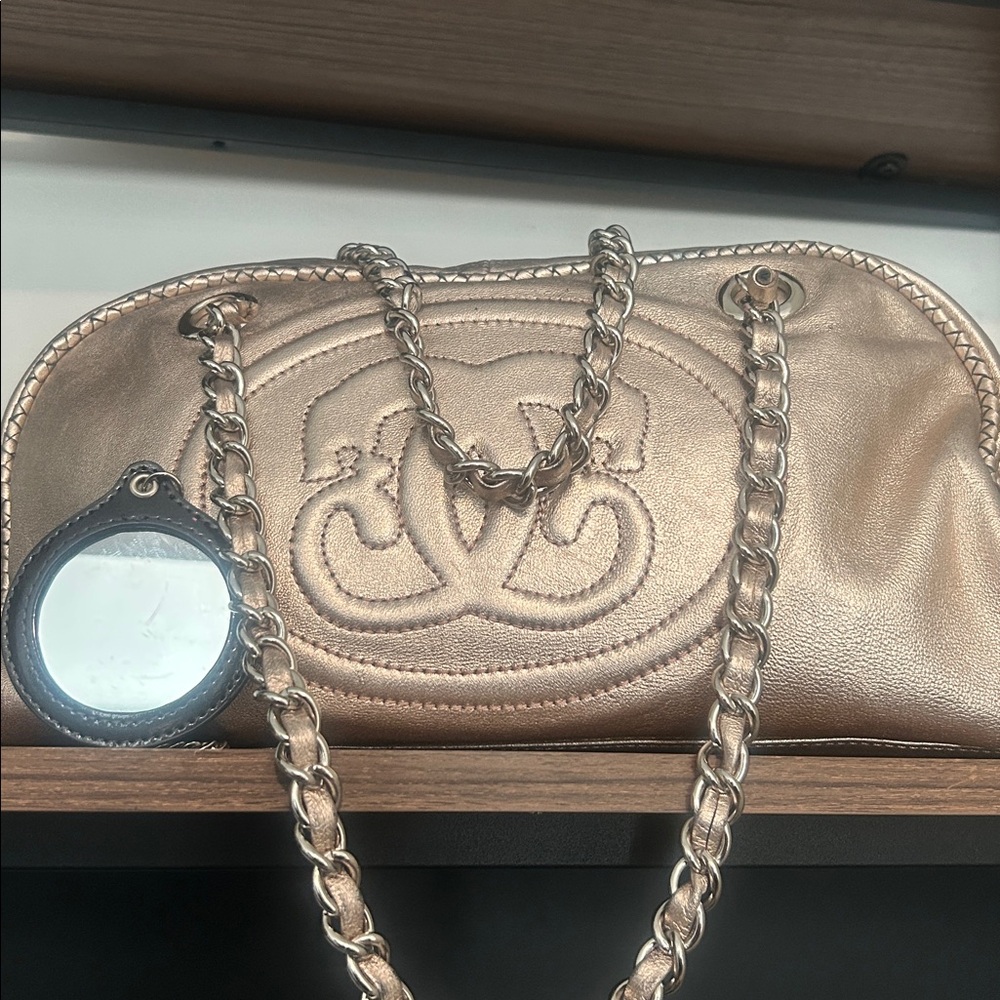 Sharif Gold Embossed Shoulder Bag